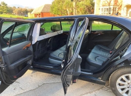 Black limousine for weddings in Ashford